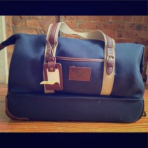 Plaid-lined canvas travel bag
